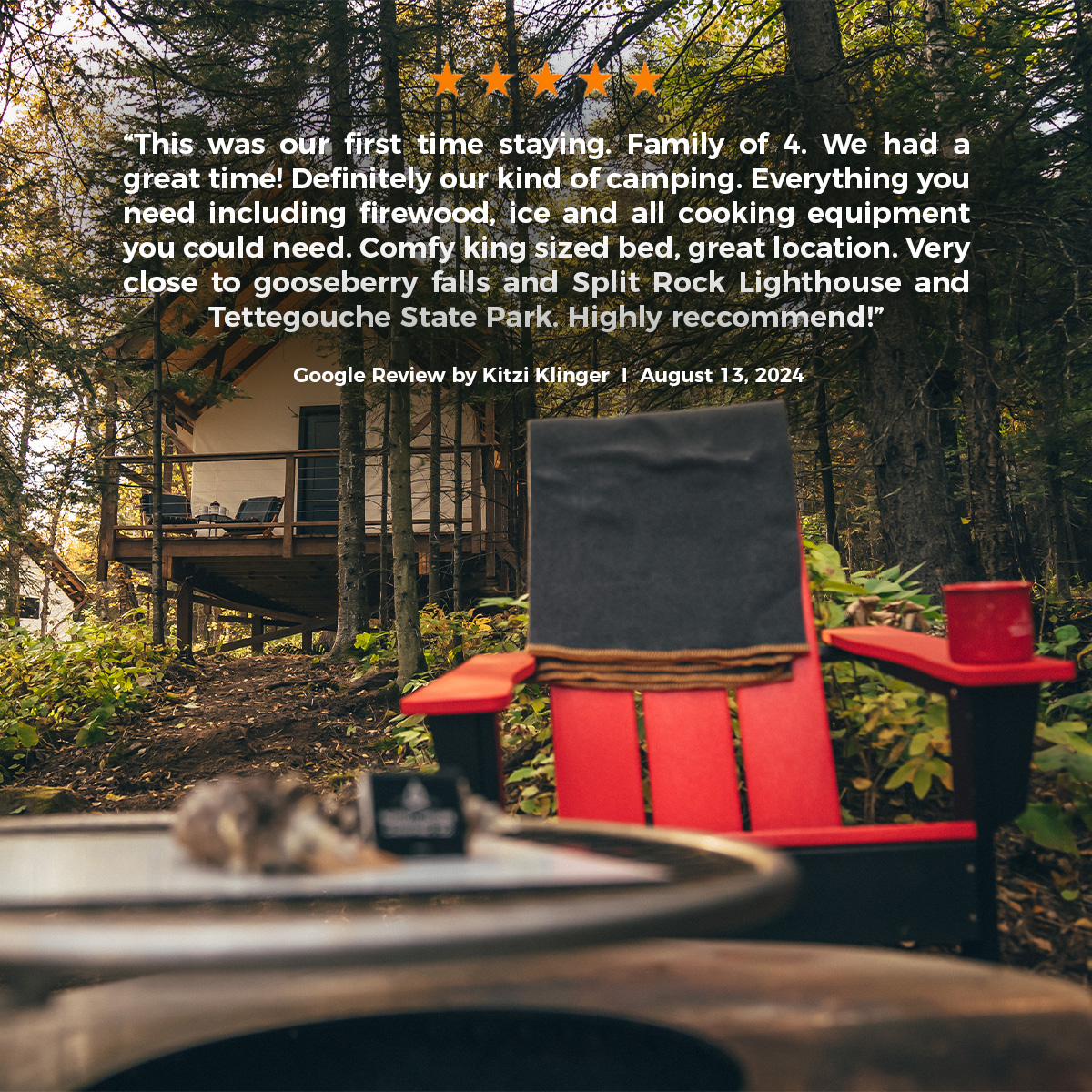 Cabin in forest with patio chairs and reviews.