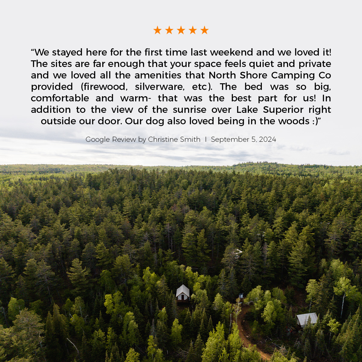 Five-star camping review with forest and cabin view.