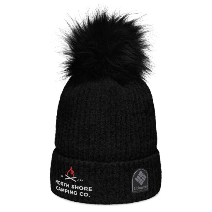 Black beanie with pom-pom, North Shore logo.