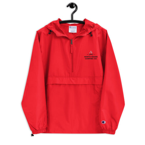 Red pullover windbreaker jacket on hanger, logo visible.