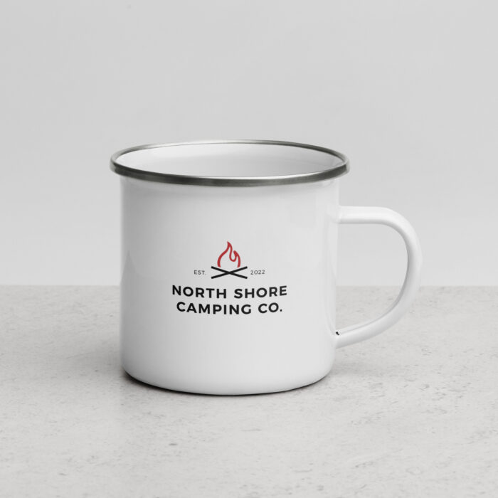 Camping mug with campfire logo and text