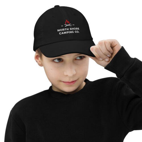 Child wearing North Shore Camping Co. cap