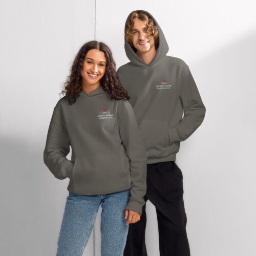Two people wearing gray hoodies with logos.