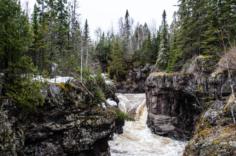 dsc 0070 Forest waterfall between rocky cliffs in winter.