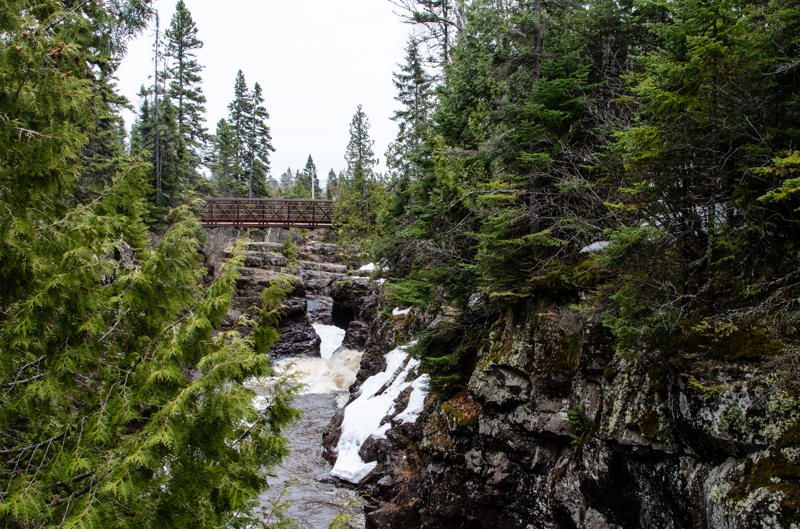 dsc 0076 Wooden bridge over rocky forest river in winter