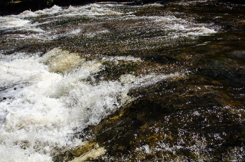 dsc 0137 Flowing river with rocks and white water.