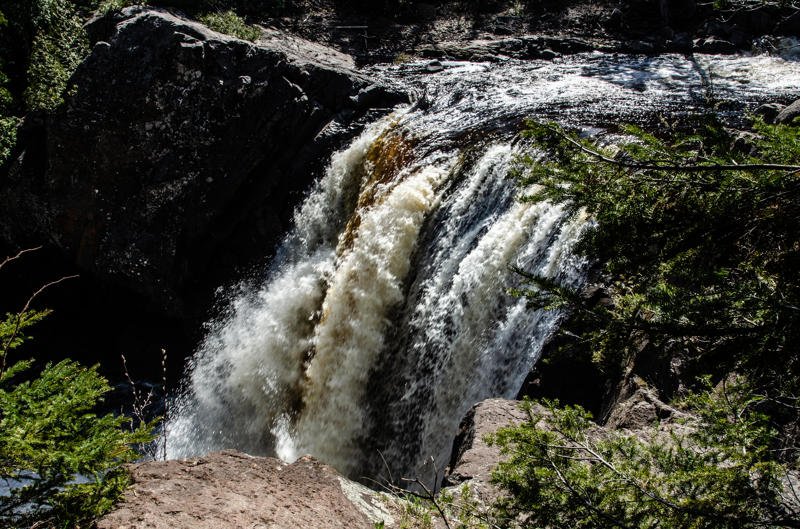 dsc 0229 Sunlit waterfall in wooded area